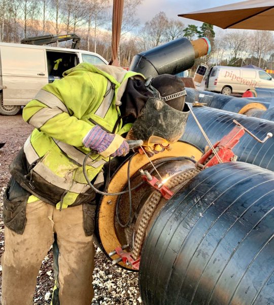 butt welding in process, district heating pipes