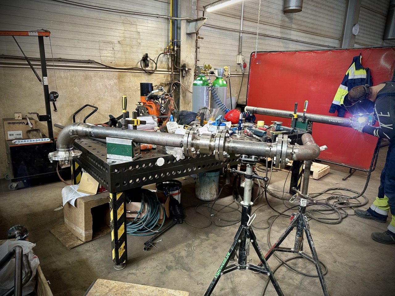 Prepared pipe section ready for welding in a pipe fabrication workshop. Cleaned edges and precise alignment ensure high-quality welds.