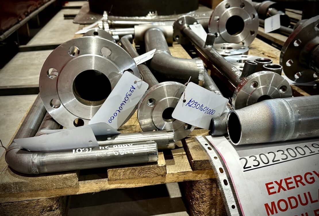 Prefabricated pipe spools with indicator marking prepared by a piping installation company for industrial construction